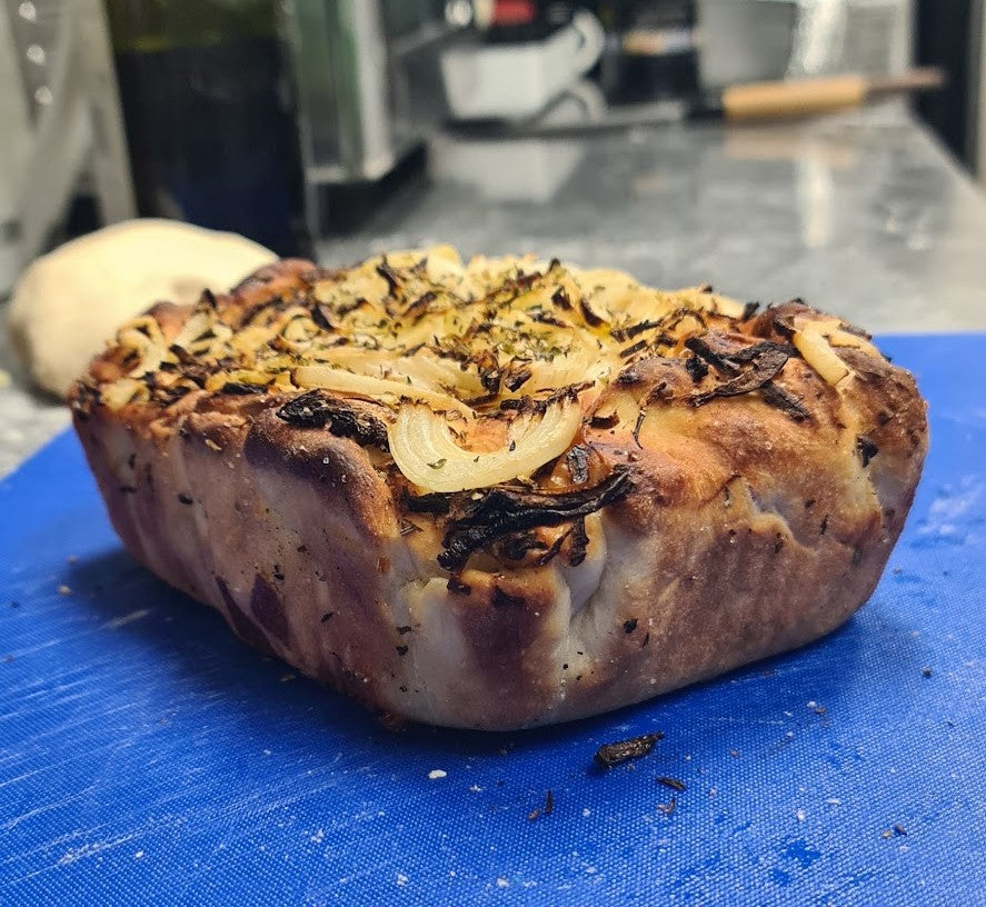 Fugazzeta – Argentinian stuffed pizza with ham, mozzarella and onion